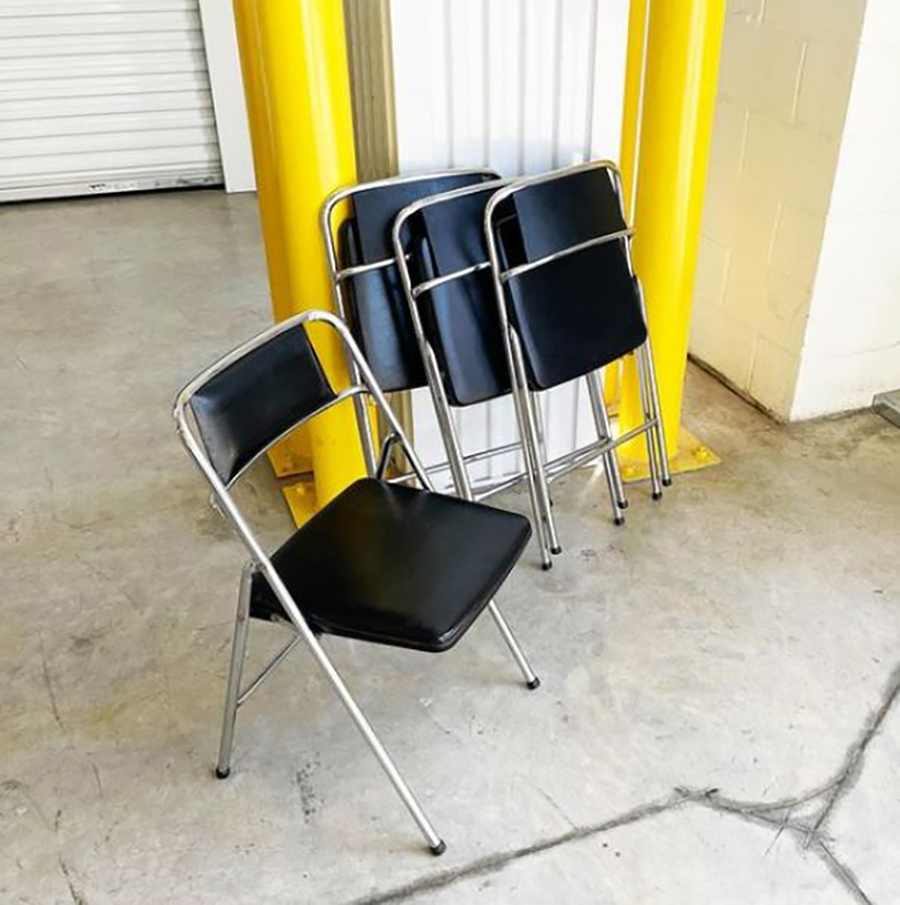Second-life chairs staged in a RESEAT warehouse